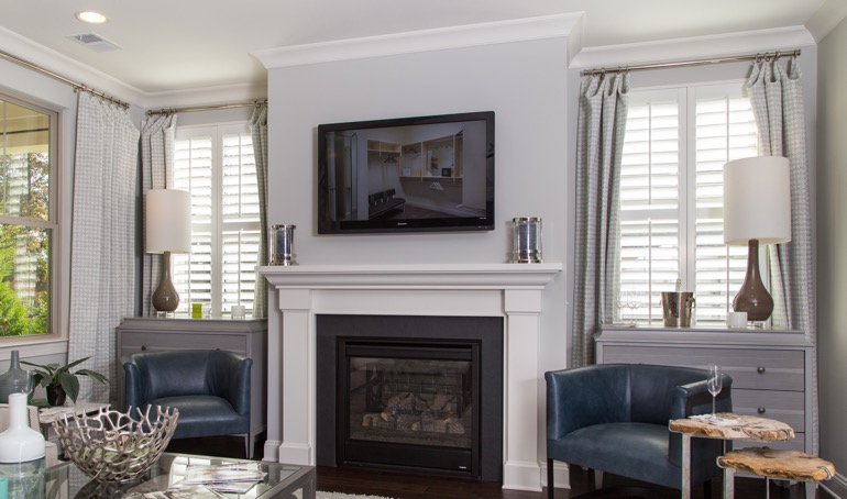 Atlanta fireplace with plantation shutters.